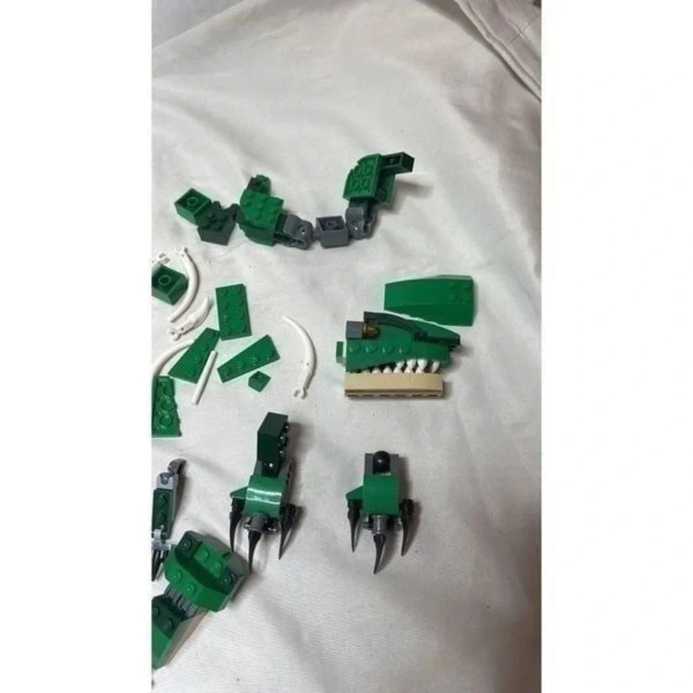 Lego Creator 3 in 1 Mighty Dinosaur Pieces.